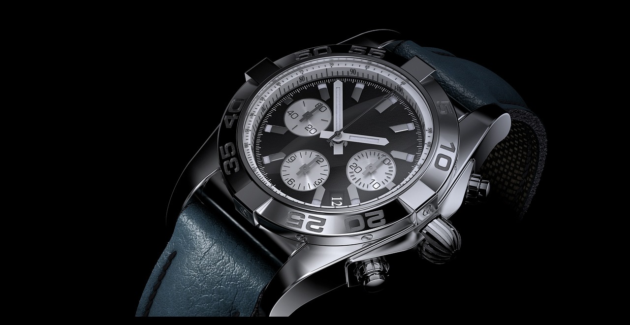 Black dial watch on leather strap